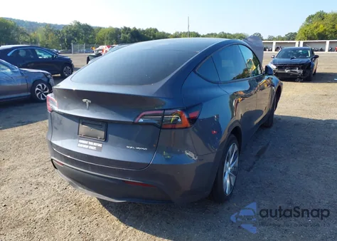 2023 Tesla Model Y from USA, damaged, VIN 7SAYGDEE1PA119472